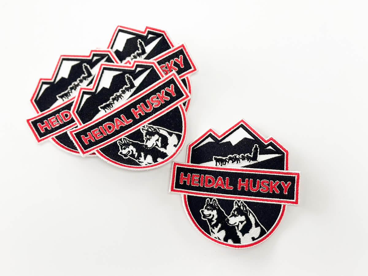Broderingsmerker produsert for Heidal Husky.