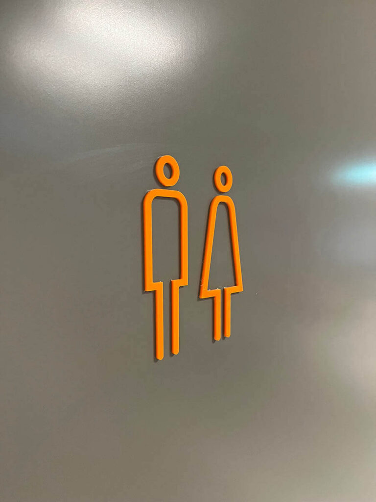 Taktile WC-skilt.